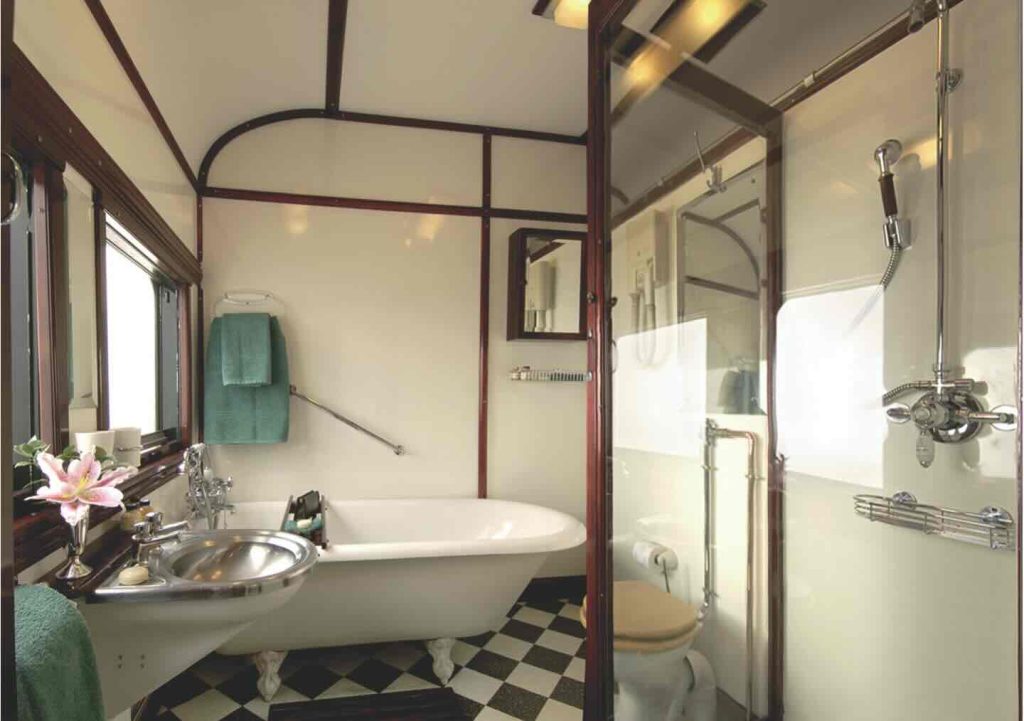 Rovos Rail Royal Suite Bathroom with roll top bath and shower