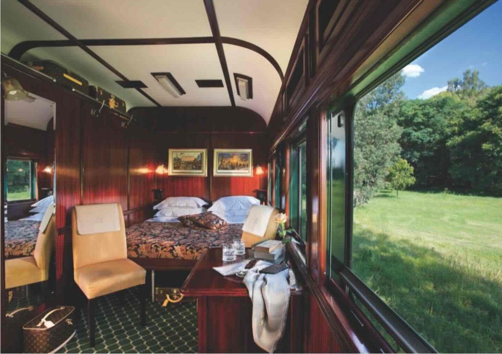 Rovos Rail deluxe Suite bedroom and seating area