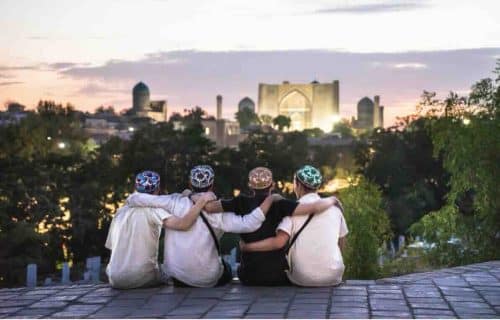 Group Of Locals Viewing The Registan in Samarkand