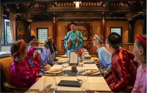 Passengers In Traditional Dress At Dinner Vietnam